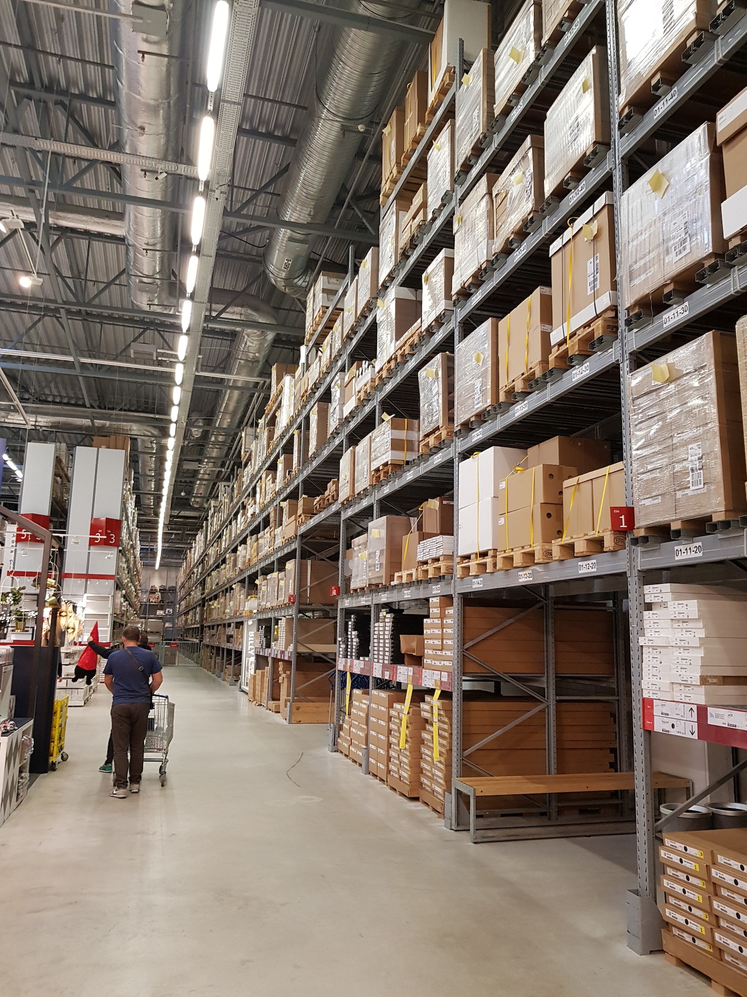 Racks with boxes in a hypermarket warehouse