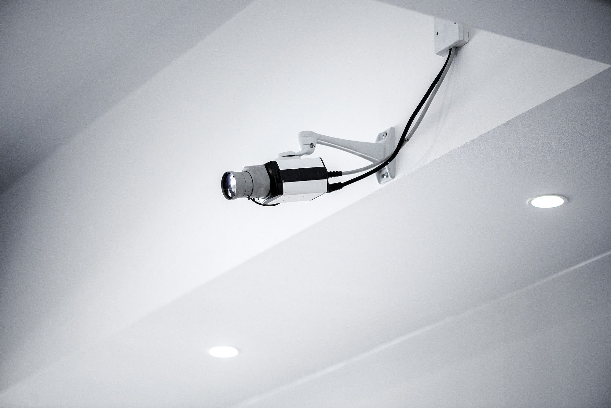 The surveillance camera on white background. Close up